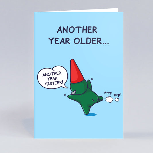 This funny greeting card for males / him / men has a cute green gnome farting. The caption reads 'Another Year Older...' and he says 'Another Year Fartier!'