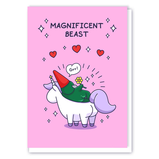 A cheeky gnome is laying on a unicorn with flowers, sparkles and hearts. This beautiful card has the caption 'Magnificent Beast'.
