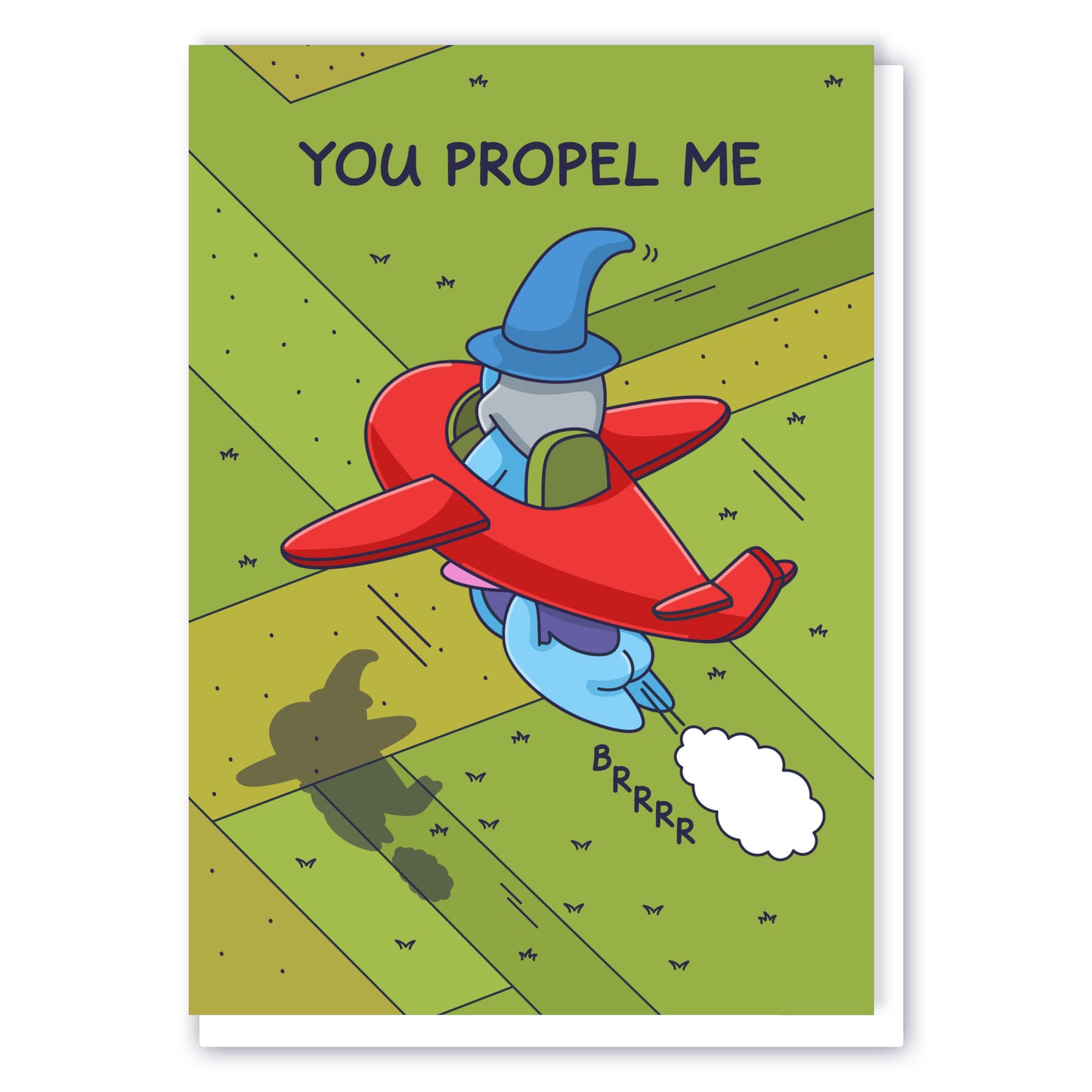 A greeting card of a Wizard sitting in a cute red plane with a Witch flying propelling him forward. The caption reads 'You Propel Me'.