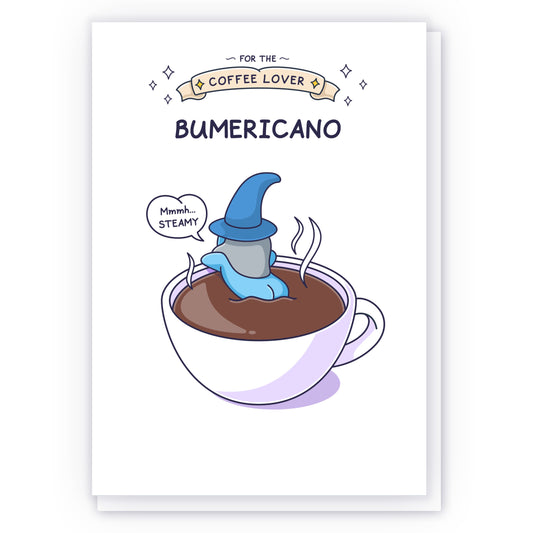 A small wizard is sitting in a cup of coffee with his perky bottom sticking out and saying 'Mmmh steamy'. The caption reads 'For the Coffee Lover, Bumericano'.