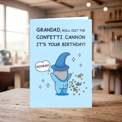 Birthday card with wizard illustration and text on a wooden table