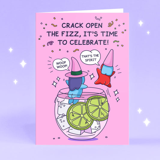 A cute witch is cheering while floating on a large glass of fizz. Her friend a cute red gnome is cheering 'That's the Spirt'. The caption reads 'Crack Open the Fizz, it's time to Celebrate!'