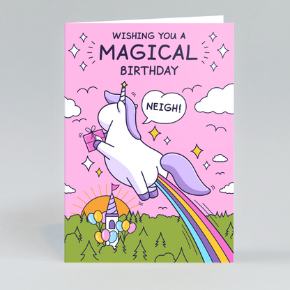 A beautiful unicorn is holding a present while flying with a rainbow. There is a cute white castle with balloons.