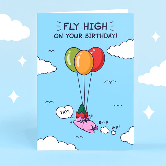 A mischievous elf is flying through blue skies using three party balloons. The caption reads 'Fly High on Your Birthday!'.