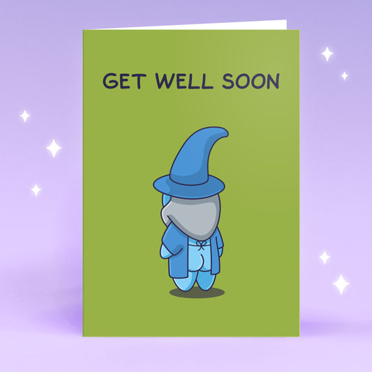 A funny cartoon of a wizard in a hospital robe with his bottom peaking. The message reads 'Get Well Soon'.