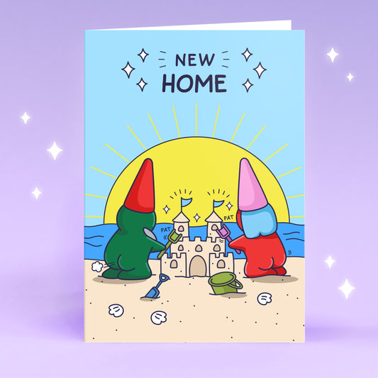 Funny New Home card with two gnomes building a sandcastle together. 