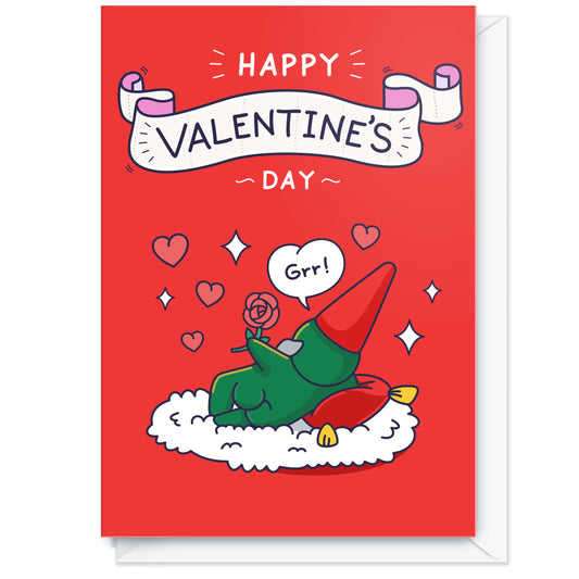Valentine's Day card with a cartoon character with a red hat on a rug, holding a rose, with 'Happy Valentine's Day' text above.