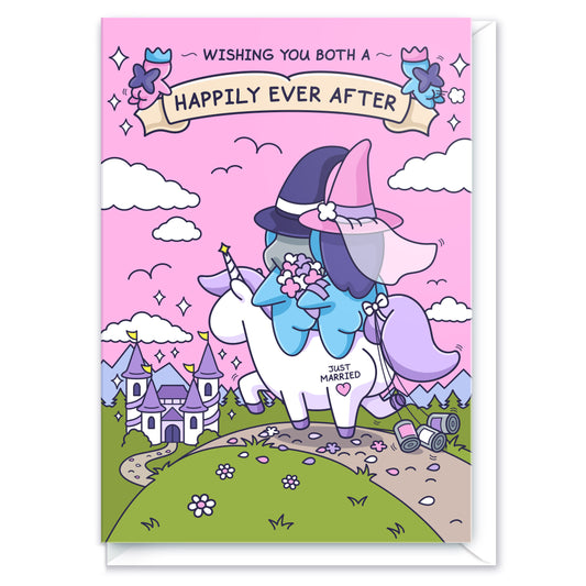 A gorgeous greeting card features a beautiful castle and a newly wedded couple riding together on a unicorn. There is a banner with the message 'Wishing you both a Happily Ever After'.