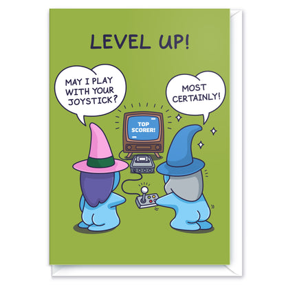 This funny computer game inspired greeting card has a cute wizard and witch couple playing a game. The Witch asks 'May I play with your Joystick' and the Wizard says 'Most certainly!' The title reads 'Level Up!' 