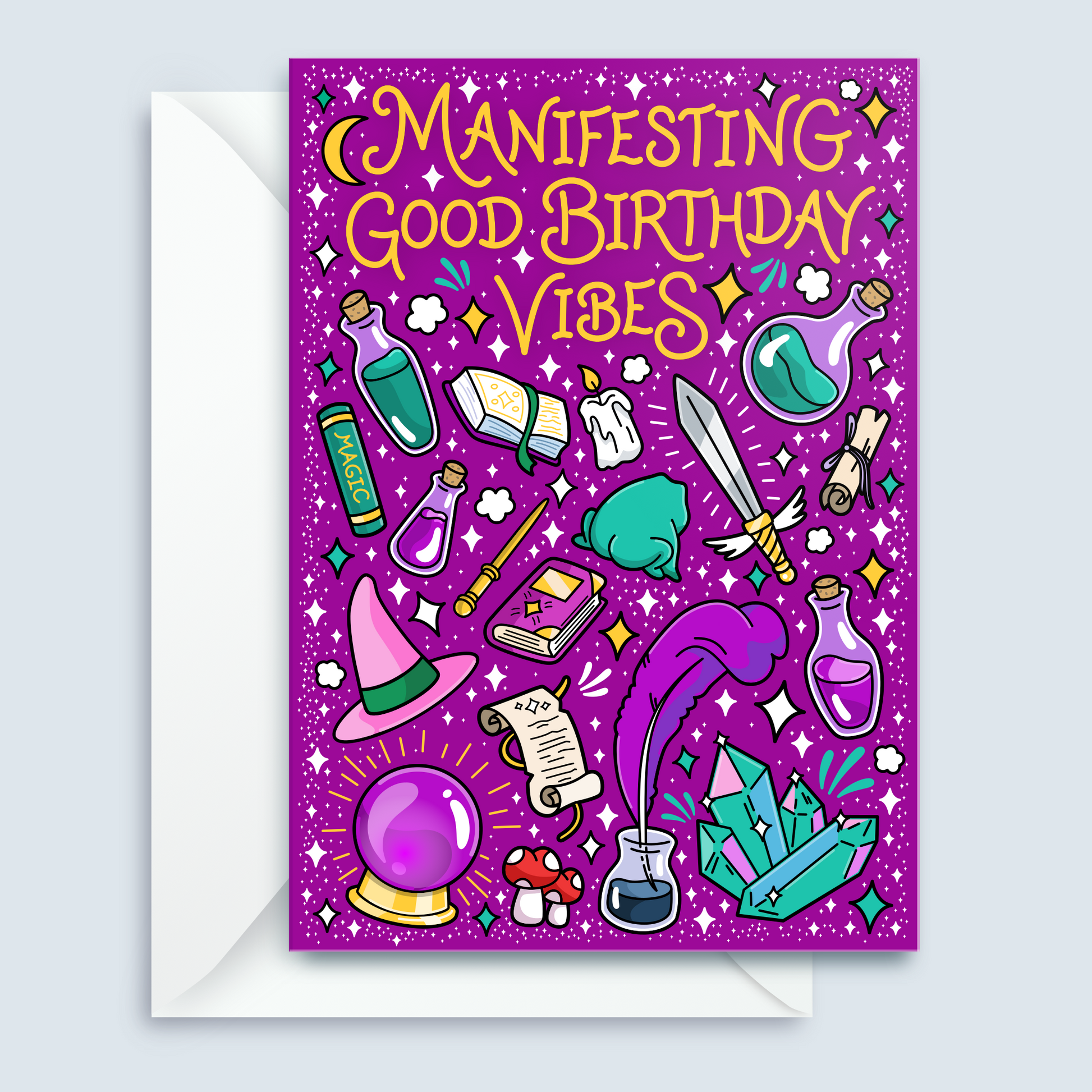 A purple birthday card with whimsical witch-themed illustrations and the text 'Manifesting Good Birthday Vibes,' shown with a white envelope on a light gray background.